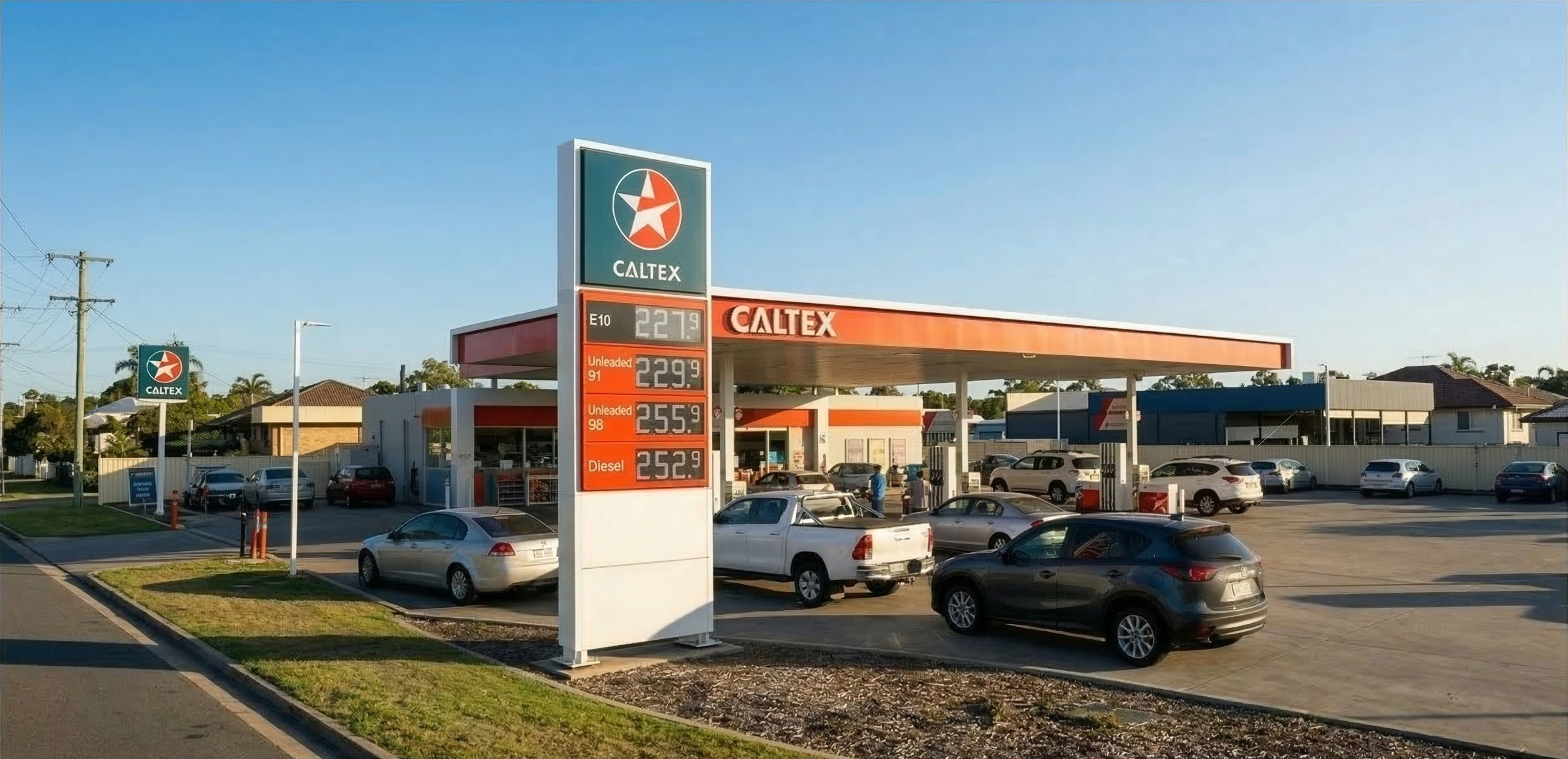 Fuel Crisis with cars lined up at a service station with high fuel prices - Carpooling Solution